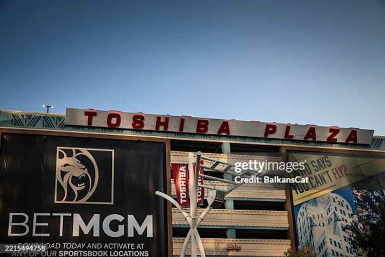Toshiba plaza, by the T-Mobile Arena parking structure on the Las Vegas Strip; below, a large BetMGM banner. It"s a square and a pre-event venue.