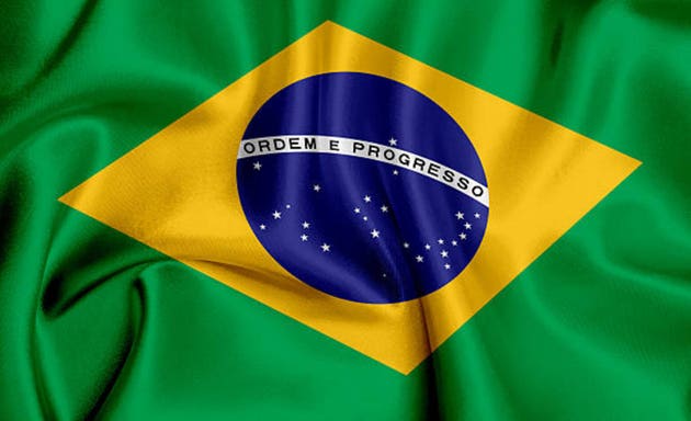 Vector flag of Brazil waving background