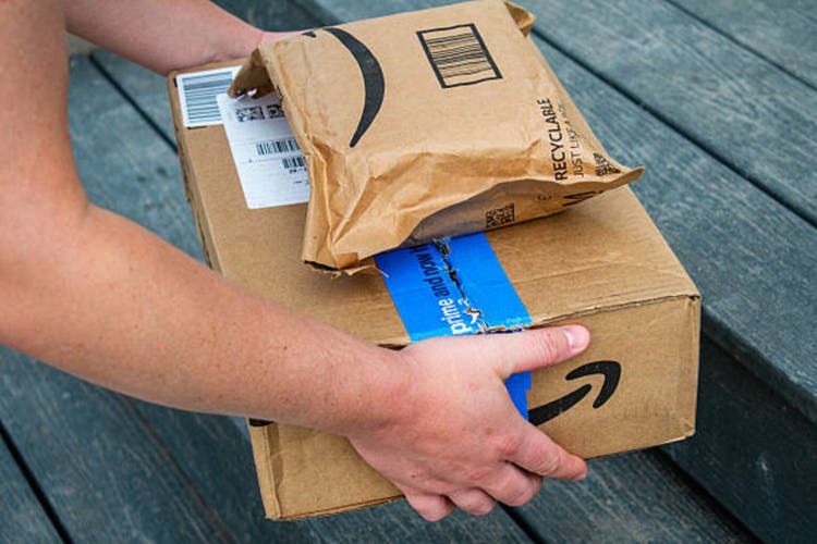 Amazon Delivery Worker Places Prime Packages on Doorstep in San Francisco