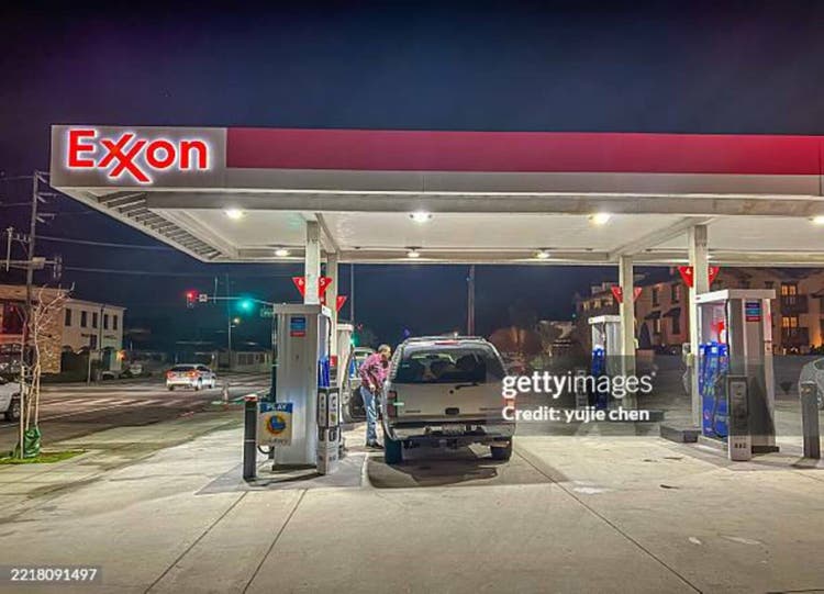 Exxon petrol station at night in Monterey, CA.