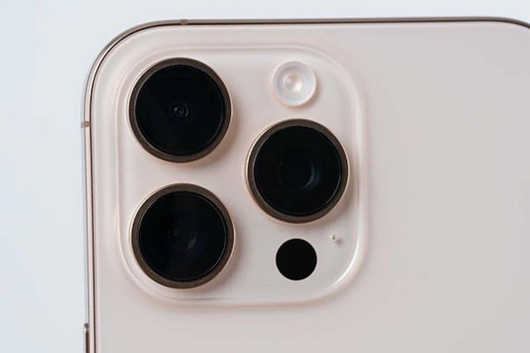 Desert Titanium iPhone 16 Pro Max on a white background