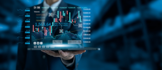 Businessman holding tablet with holographic stock market chart. Financial trading, investment analysis, data visualization, and futuristic fintech technology for modern business and economic strategy.