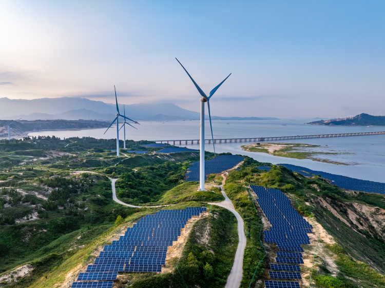 Solar photovoltaic windmill wind energy at sunset