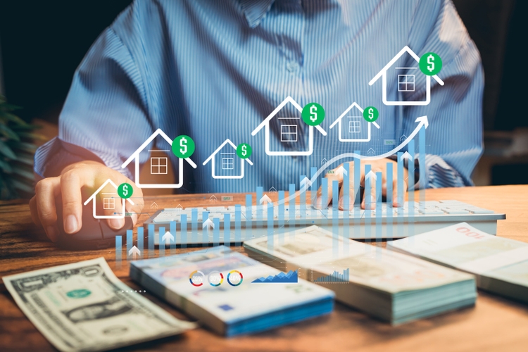 Real Estate. Hands Working with Financial Charts and Data Symbols Representing Real Estate Investment Growth and Profit Potential