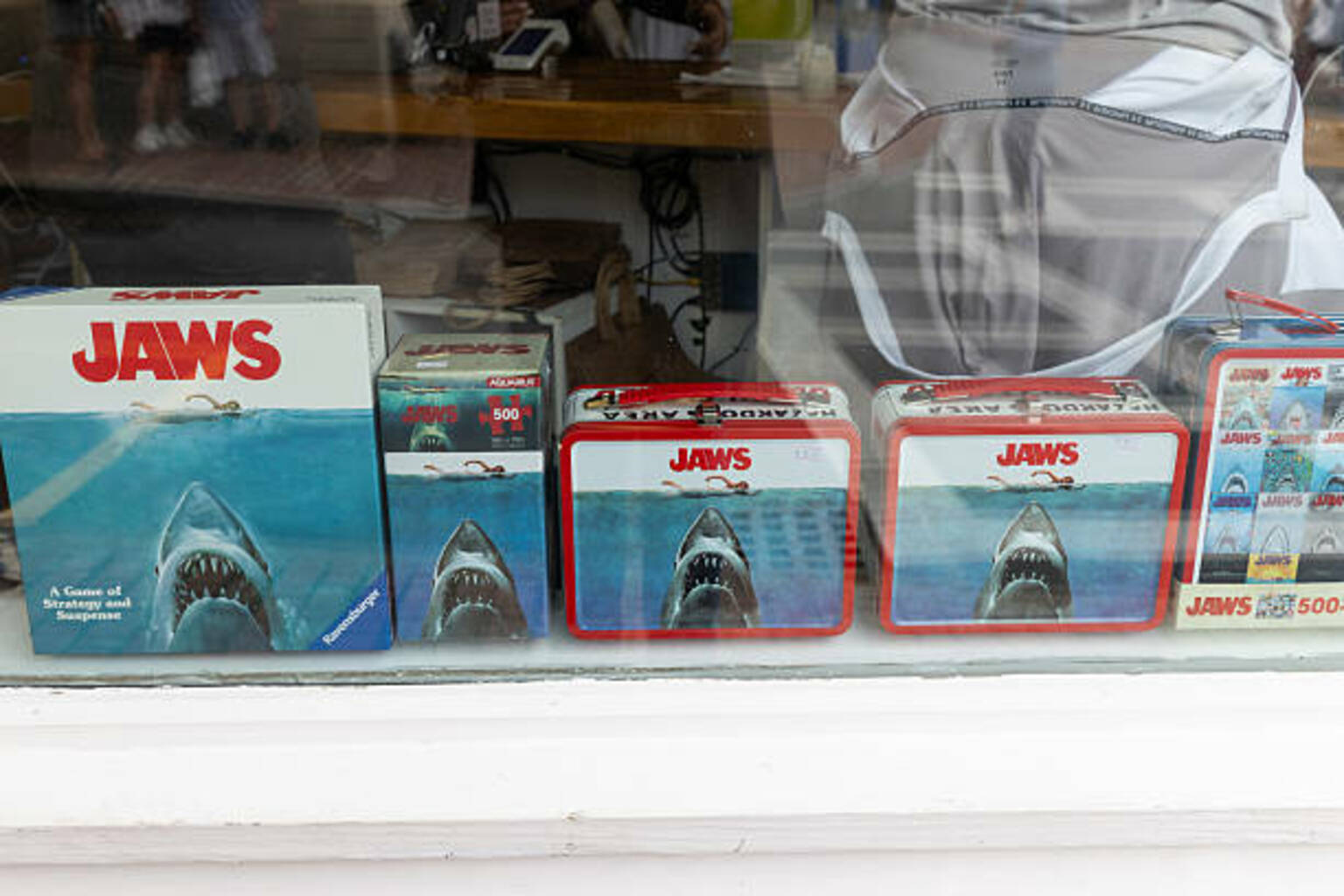 Weapons' stays on top, but 'Jaws' re-release takes big bite of box