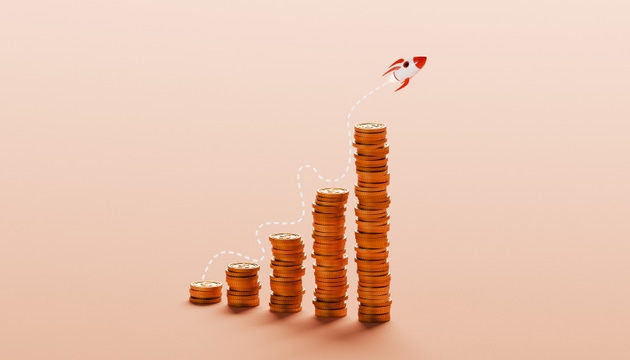 Trajectory of Success – Rocket Ignites from Peak of Coin Stack Growth Chart in Symbol of Financial Breakthrough