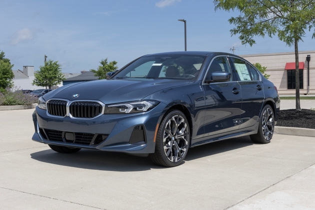 BMW 330i xDrive sedan display at a dealership. BMW offers the 330i with a 2.0L Twin-Power Turbo mild hybrid engine. MY:2025