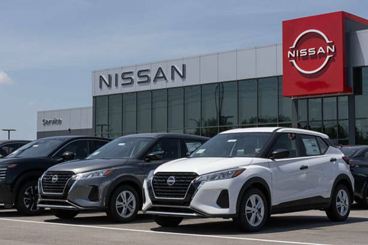 Nissan Kicks Play Subcompact Crossover SUV display at a dealership. Nissan offers the Kicks in S, SV, Play and SR models.