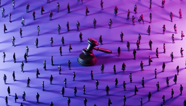 Corporate Accountability and Legal Power Concept with Oversized Gavel and Business Crowd