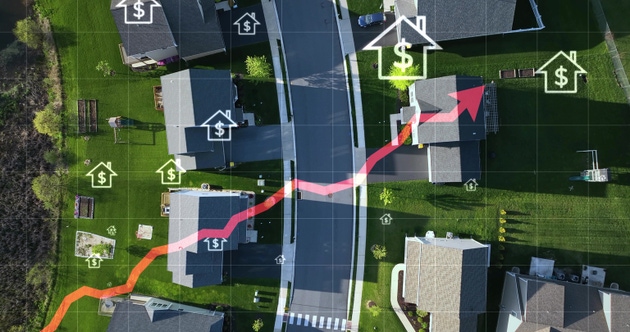 Aerial of a rural American neighborhood with rising arrow and dollar signs