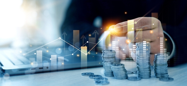 Saving money concept.Stack of coins with trading price graph growth.Money business financial graph diagram of coin. Financial growth data or investment market profit bar and success report.