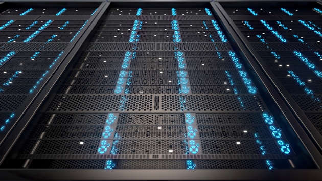 Rows of servers illuminated by bright colorful lights