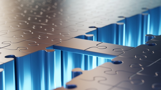 An abstract bridge made with two puzzle pieces across empty space with blue glow bridging two parts of a big puzzle