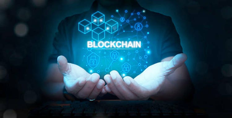 businessman showing a smart contract and executing a cryptocurrency transaction with blockchain technology. The transaction is secure and transparent, and there are other people in the background.