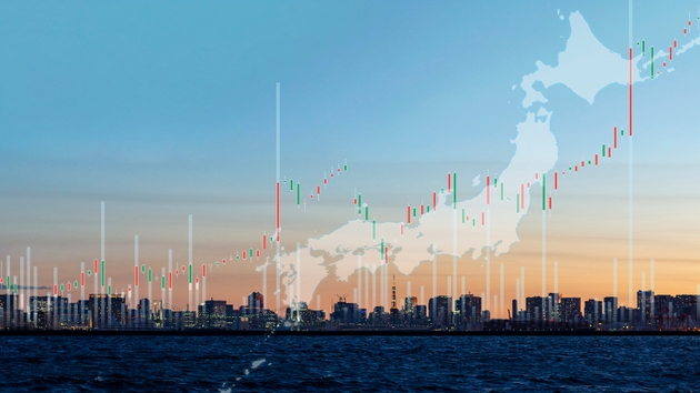 Fusion Image of Cityscape and Chart Visualizing Japan’s Economic Growth and Market Trends