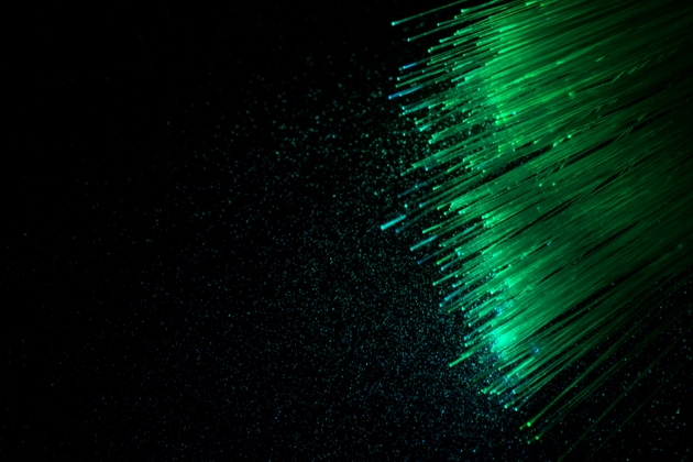 Optical fibres dynamic flying from deep on technology background