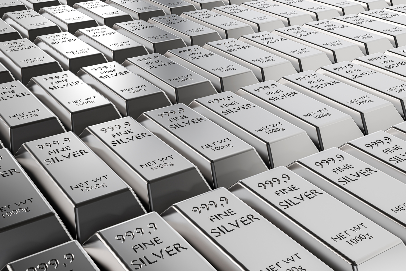 Stacks of silver bars and silver coins representing wealth preservation, inflation protection, and long-term investment opportunities in 2026.