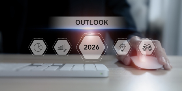 Economic, business outlook concept. Financial, business view or economic growth forecast for 2026. Businessman working on laptop with OUTLOOK 2026 text and business trend icons on virtual screen.