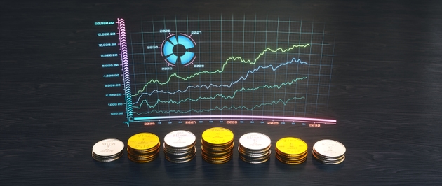 Gold and silver coins with a virtual price graph and copy space.