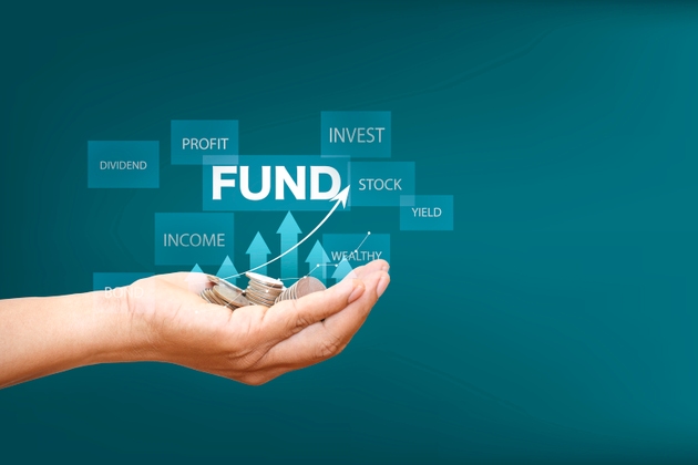 Fund, Save money, dividend and Interest rate concept. symbol and arrow pointing up on gold coins instead Return on Stocks, Funds long-term investment. income return retirement fund at stock market.