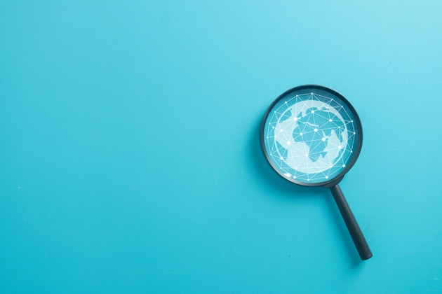 Magnifying Glass with Digital Global Network Connection
