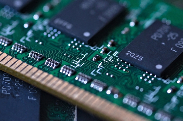 RAM memory on a surface. Macro image with details of electronic circuits and hardware.
