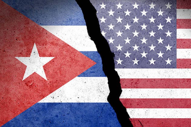 Flag of Cuba and USA painted on a concrete wall