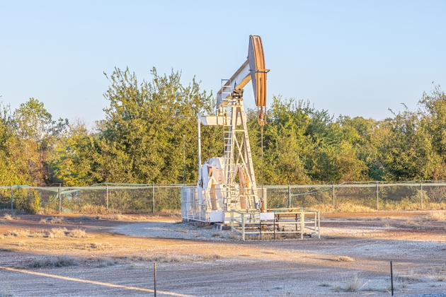 Oil pumpjack operating in an onshore oil field