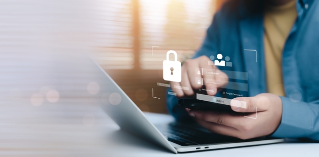 Secure login and authentication concept with lock icon user interface on smartphone and laptop, representing data privacy, digital identity, cyber security, secure access, and online system safety.