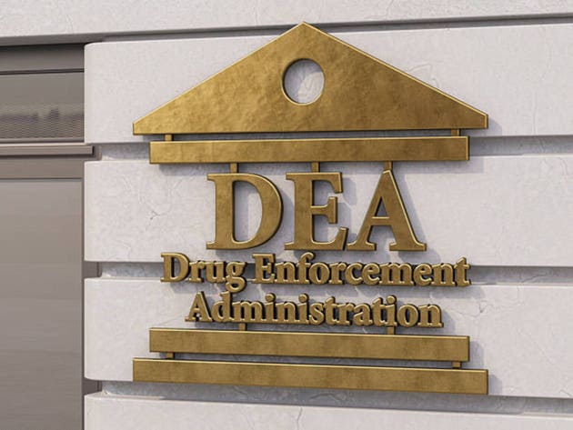 DEA Drug Enforcement Administration Sign on Office Wall