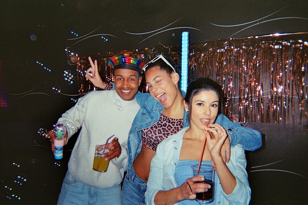 Friends enjoying celebration party with drinks and bubbles