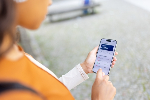 Woman checking her financial accounts on a smartphone