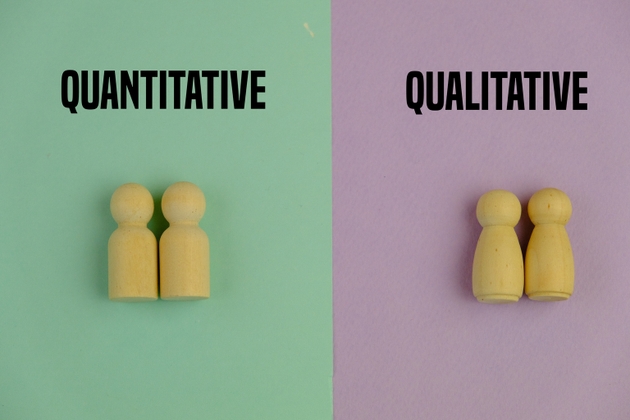 purple and green paper with the words quantitative and qualitative