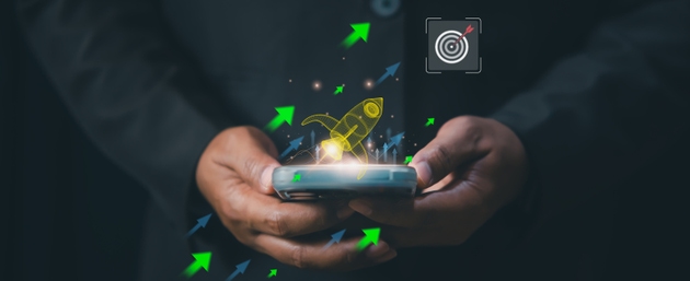 Business strategy concept featuring entrepreneur launching digital rocket graphic in creative workspace, startup growth, innovation planning, investment expansion, data success in technology market.