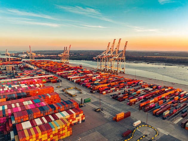 Southampton container port at sunrise showing global logistics