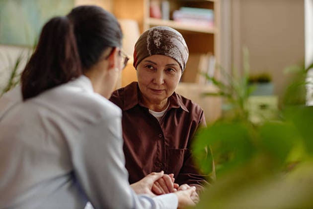 Middle Aged Woman Receiving Psychological Support from Therapist