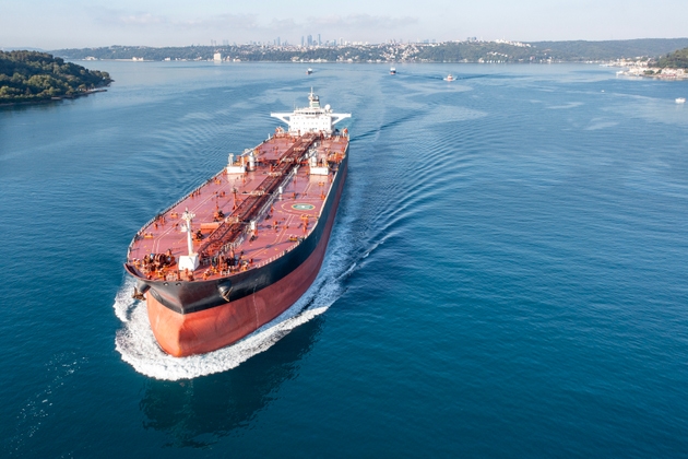 Oil tanker navigating bosphorus strait, transporting crude oil the Strait of Hormuz