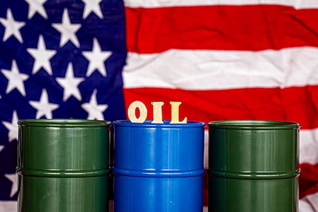 Energy Crisis or Oil Price Concept with US Flag and Industrial Barrels