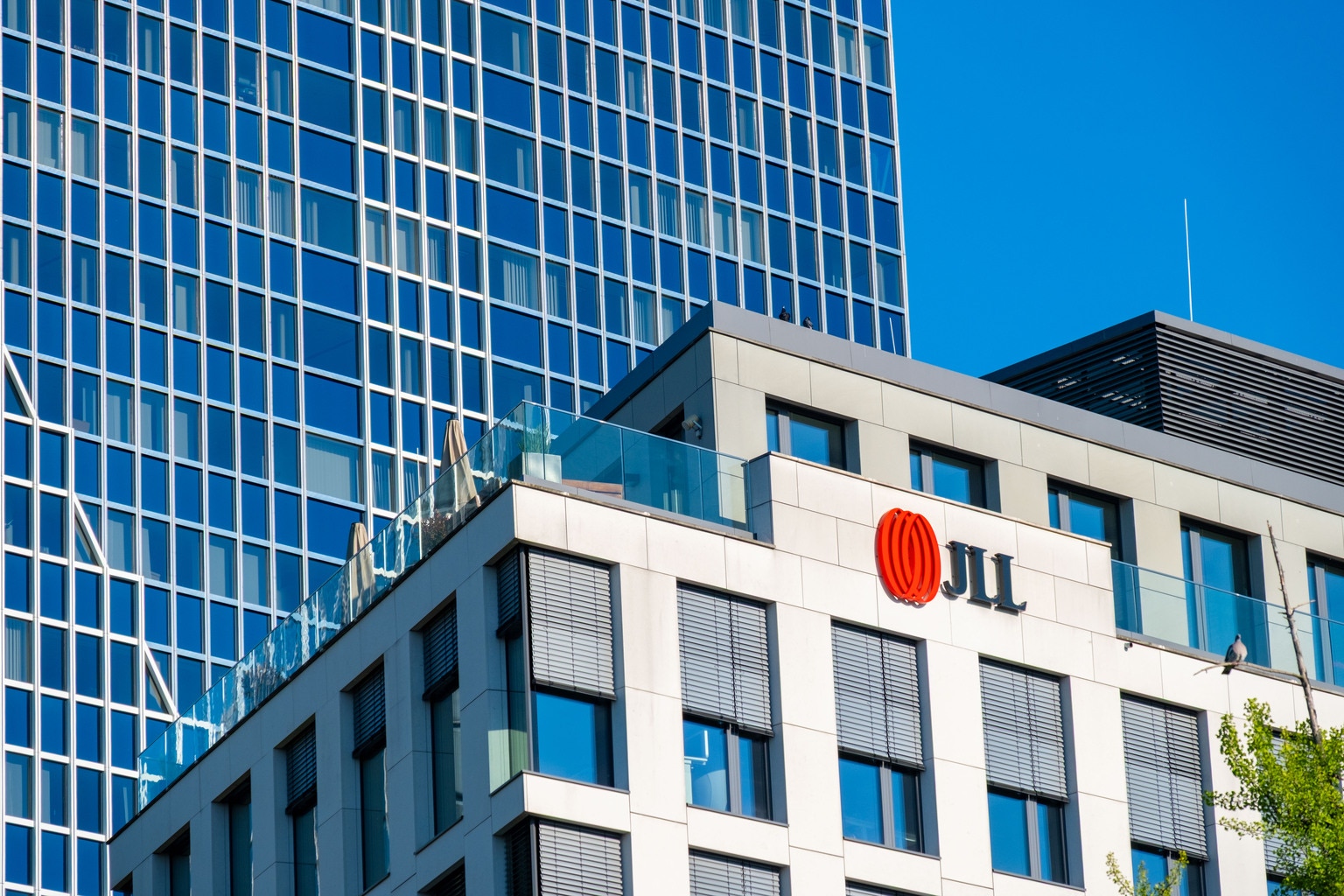 Jones Lang LaSalle Upgraded As Real Estate Services Sector Sees Tailwinds And Momentum