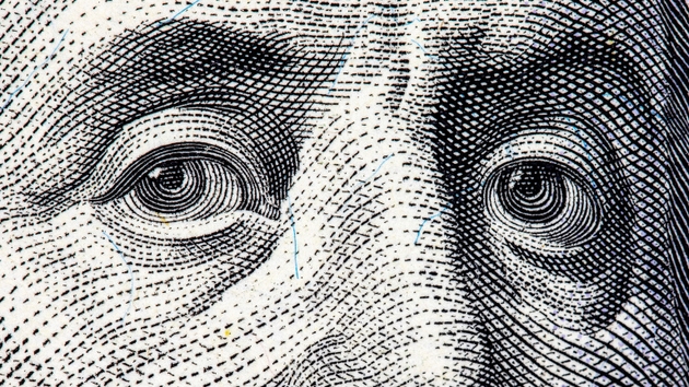 portrait of Benjamin Franklin on the US 100 dollar bill. Detailed texture of American national currency banknote. Money USA