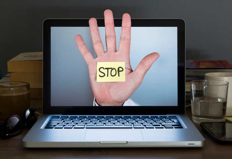 Stop the hand from appearing on the laptop computer screen