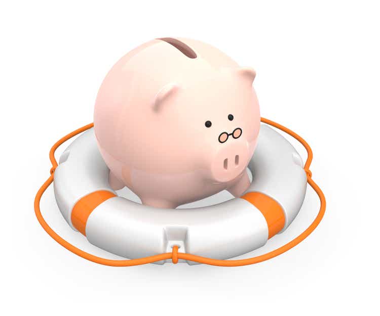 Piggy bank and life buoy