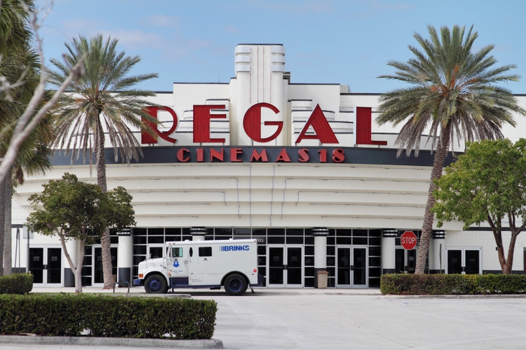 Regal Cinemas with Brinks truck making pickup