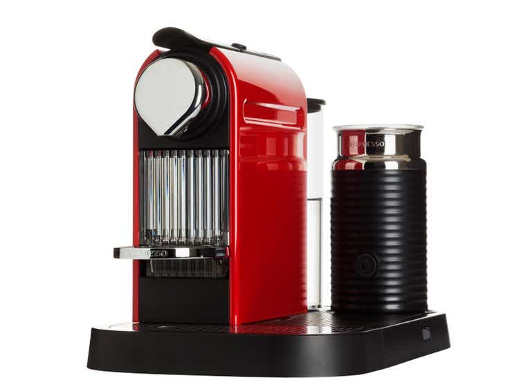 red nespresso machine isolated