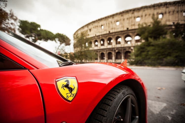Ferrari 458 Italia and Coliseum, in Rome