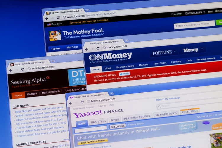 Financial information web sites on computer monitor.