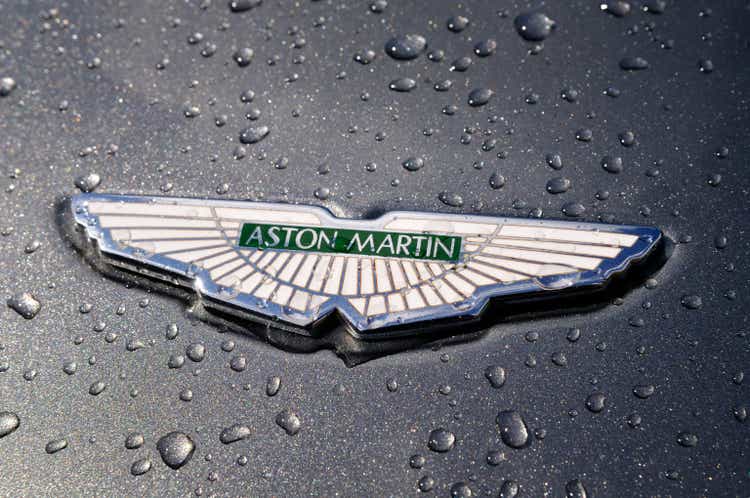 Wet Aston Martin badge on a DB7 sports car