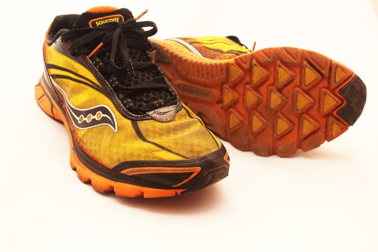 Worn Out Saucony Running Shoes
