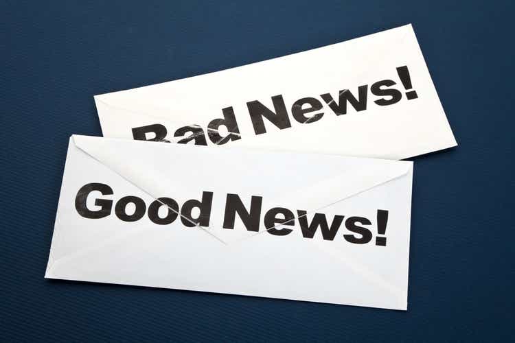 Two envelopes containing good and bad news