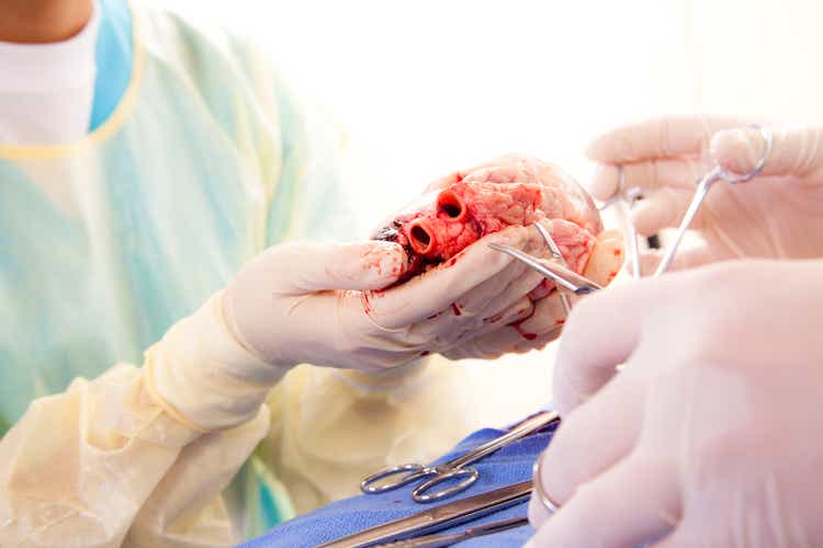Healthcare: Medical students learn heart surgery procedure.